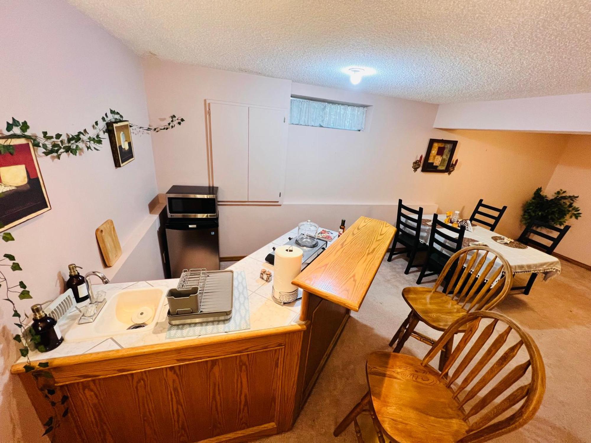 A Classic Homely Basement Suite! Chestermere Kültér fotó